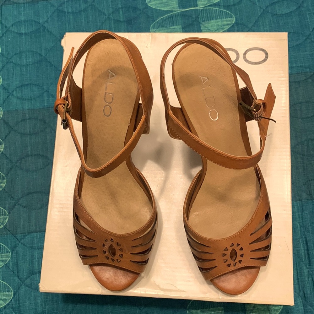 Aldo McNertney brown platform.